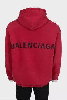 Men's red hoodie with a print on the back