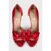 Red textile shoes with a bow