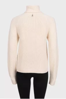 Beige knitted turtleneck sweater