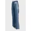 Flared jeans with raised seams