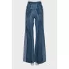 Flared jeans with raised seams