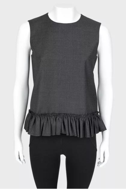 Ruffled blouse with tag