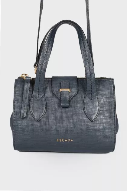 Dark blue bag with gold hardware
