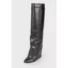 Leather boots on a hidden wedge