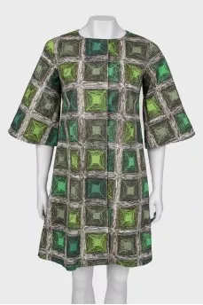 Coat with a print on the buttons