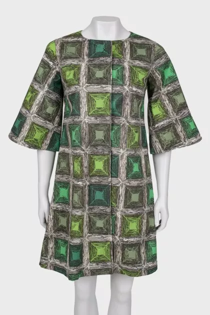 Coat with a print on the buttons