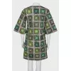 Coat with a print on the buttons