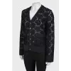 Lace jacket with a tag