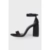 Suede sandals with massive heels