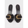 Sandals with a textured golden buckle