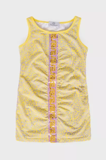 Children's dress with a pattern of sequins