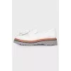 Leather loafers with tassels
