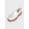 Leather loafers with tassels