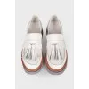 Leather loafers with tassels