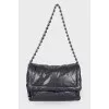 Leather bag with a puffy texture