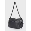 Leather bag with a puffy texture