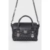 Leather bag with a textured logo