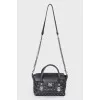 Leather bag with a textured logo