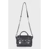 Leather bag with a textured logo