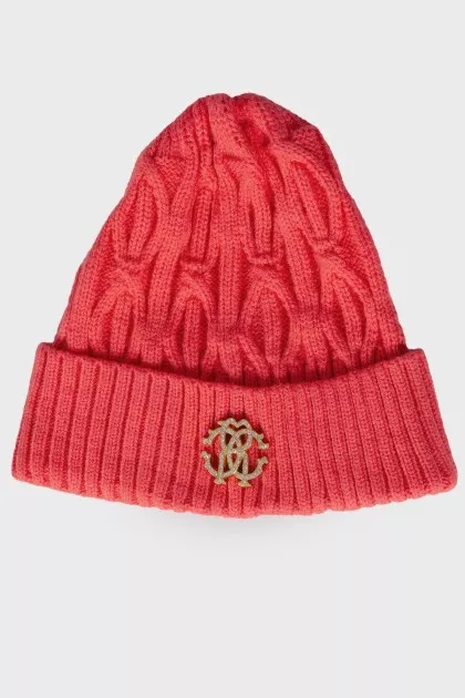 Bright pink hat with a brand logo