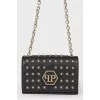 Leather bag with spikes