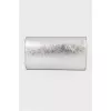 Silver clutch on the button