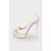 White shoes with a bow