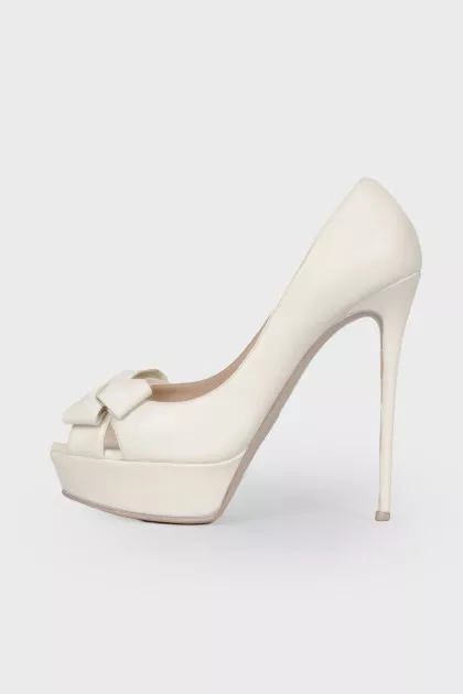 White shoes with a bow