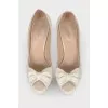 White shoes with a bow