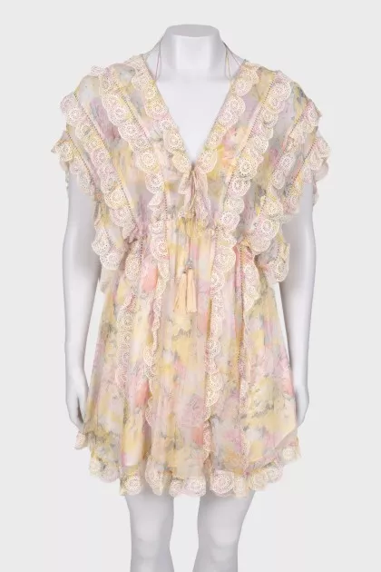 Dress with lace and brushes