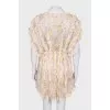 Dress with lace and brushes