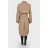 Double-breasted trench coat with a belt