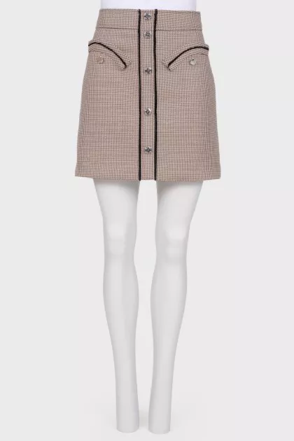 Skirt with fringe and buttons