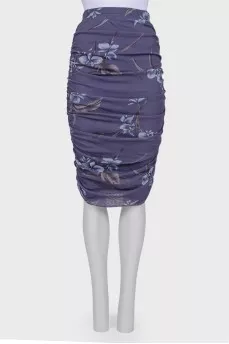 Skirt with drape with a tag