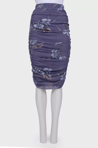 Skirt with drape with a tag