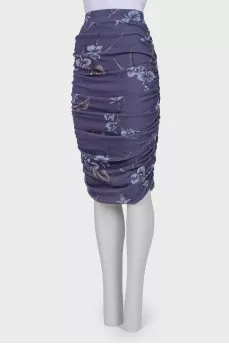 Skirt with drape with a tag