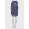 Skirt with drape with a tag