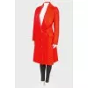 Red coat of fitted silhouette