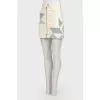 Skirt with geometric inserts with a tag