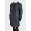 Down jacket with ties on the collar