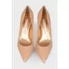 Peach shoes with a shiny coating