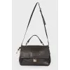 Leather bag with a lock with a key