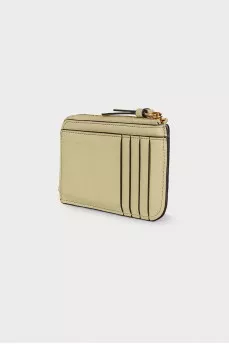 Leather light green wallet with a tag