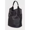 Leather bag with tassels