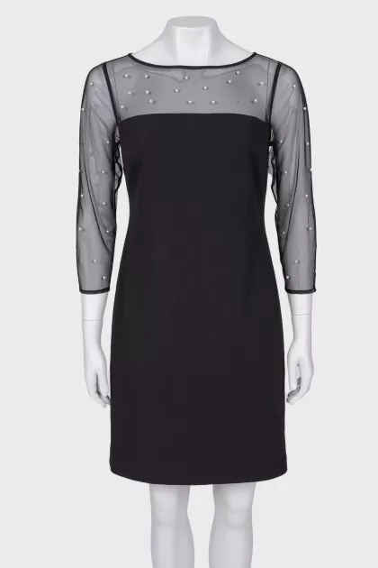 Dress with translucent sleeves and pearls