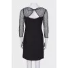 Dress with translucent sleeves and pearls