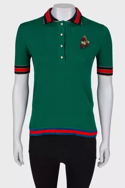 Polo with an application on the chest