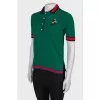 Polo with an application on the chest