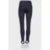 Black trousers with strokes