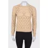 Jumper with a cut -out pattern